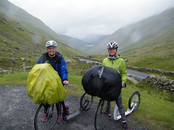 At the peak of the saddle Kirkstone Pass in the English national park The Lake District, together with her friend Petra.