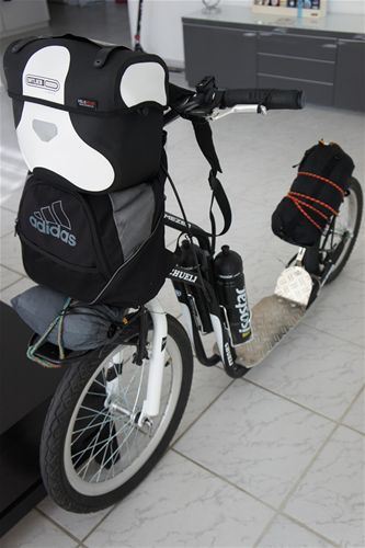 Specially adapted scooter is ready for the departure. 