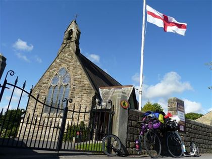 Scooter still life by the church.