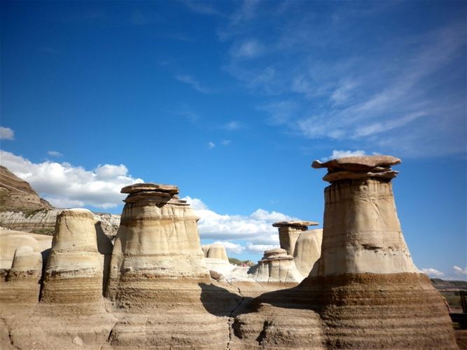 Sandstone succumbs to erosion by water and wind quicker than other types of stones. Complex processes which have effect on the rocks create diverse formations.