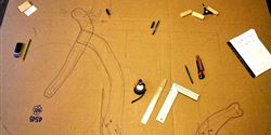 I transferred contours of every single scooter component onto the board with the aid of templates that I had prepared from a cardboard.