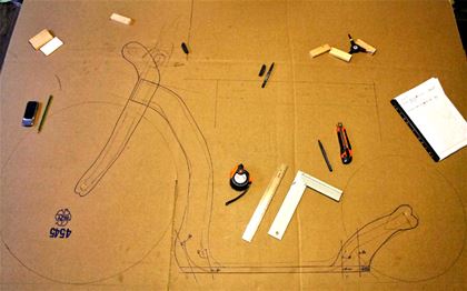 I transferred contours of every single scooter component onto the board with the aid of templates that I had prepared from a cardboard.