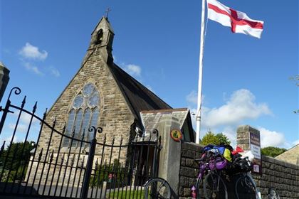 Scooter still life by the church.