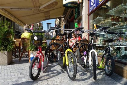 Scooters with integrated rack are stored easily when parking